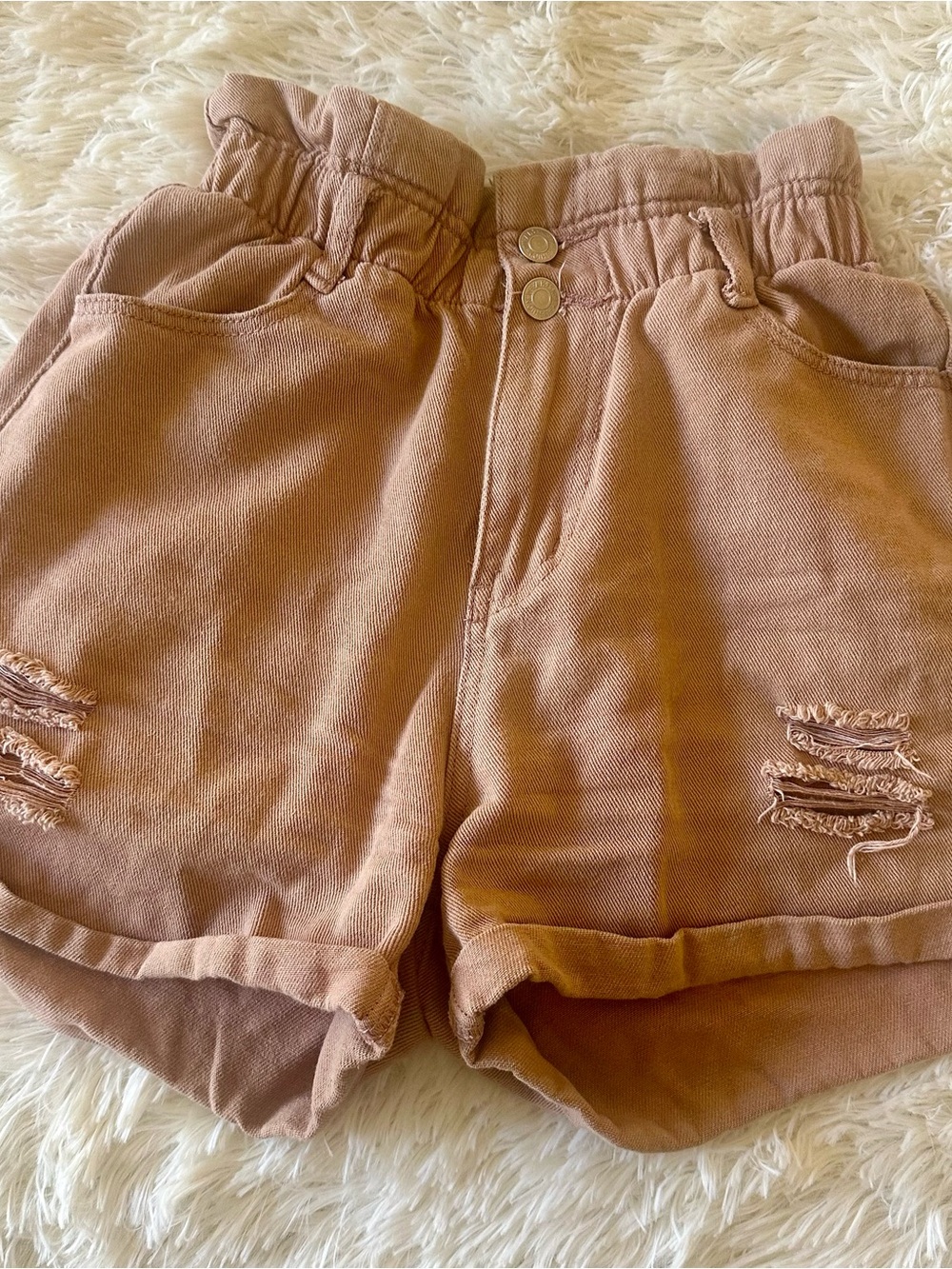 Mauve/salmon pink high-waist stretch distressed denim shorts